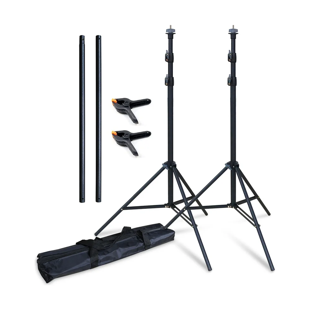Backdrop stand kit laid out: two stands, crossbar sections, clamps and carry bag
