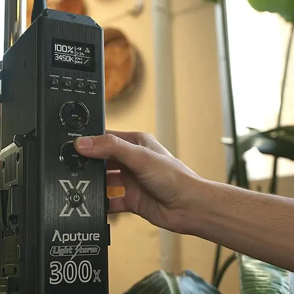 Aputure LS 300x, control box in hand, official Aputure image