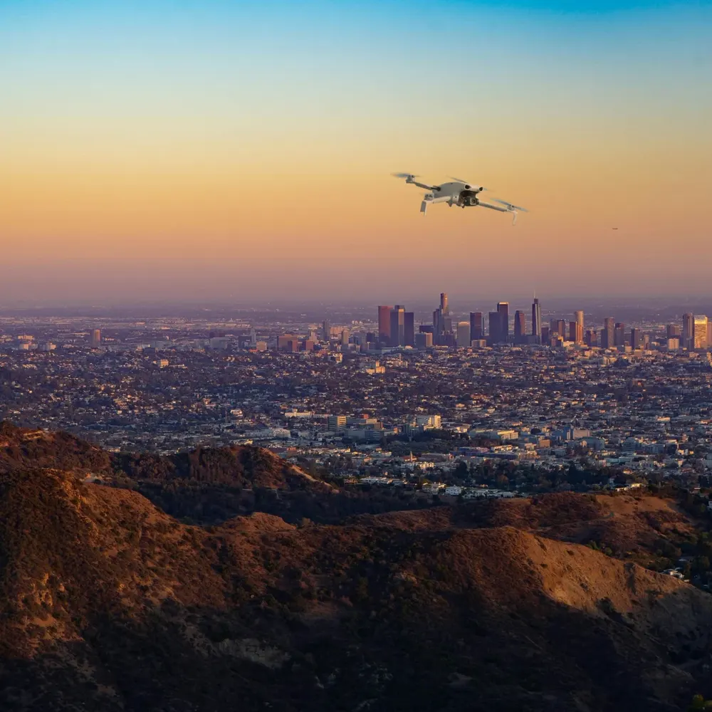 DJI Lito X1 against hills and open sky (composite image)