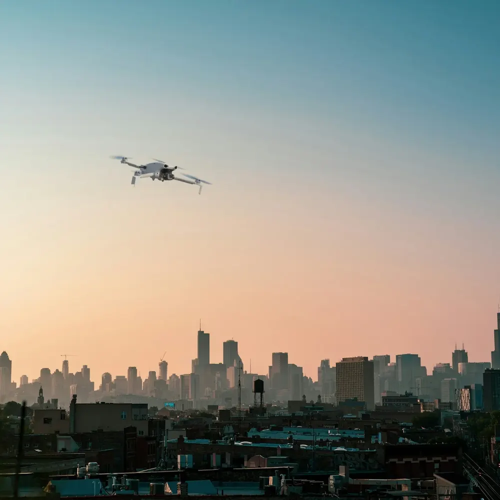 DJI Lito X1 against a city skyline (composite image)