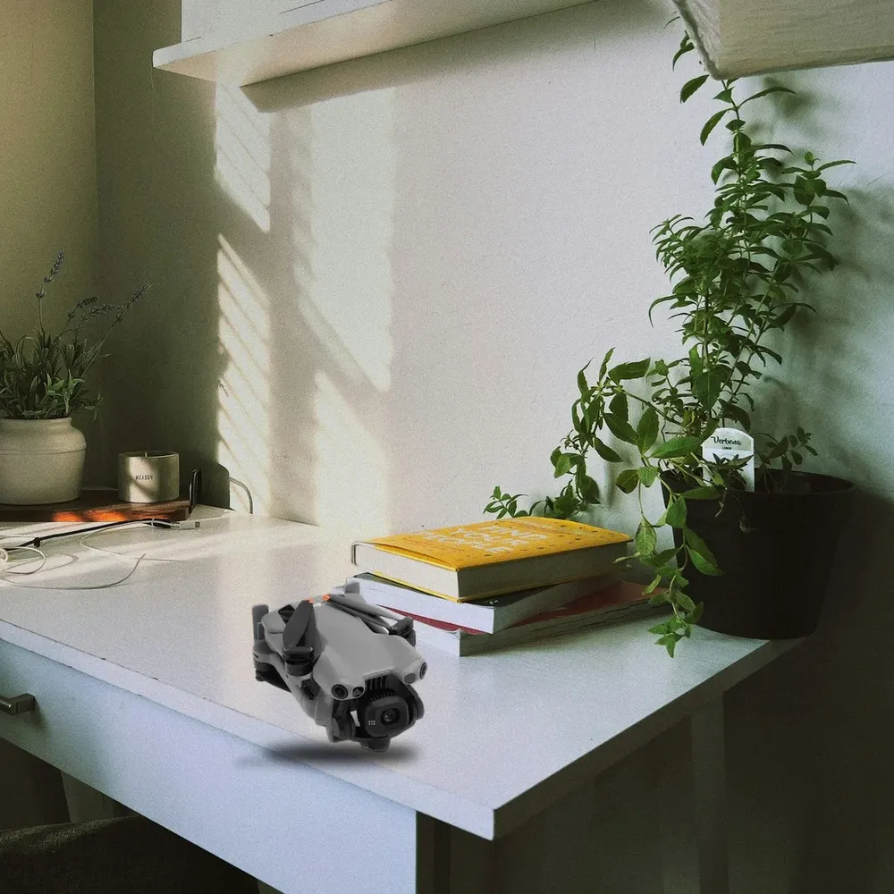 DJI Mini 5 Pro on a white desk