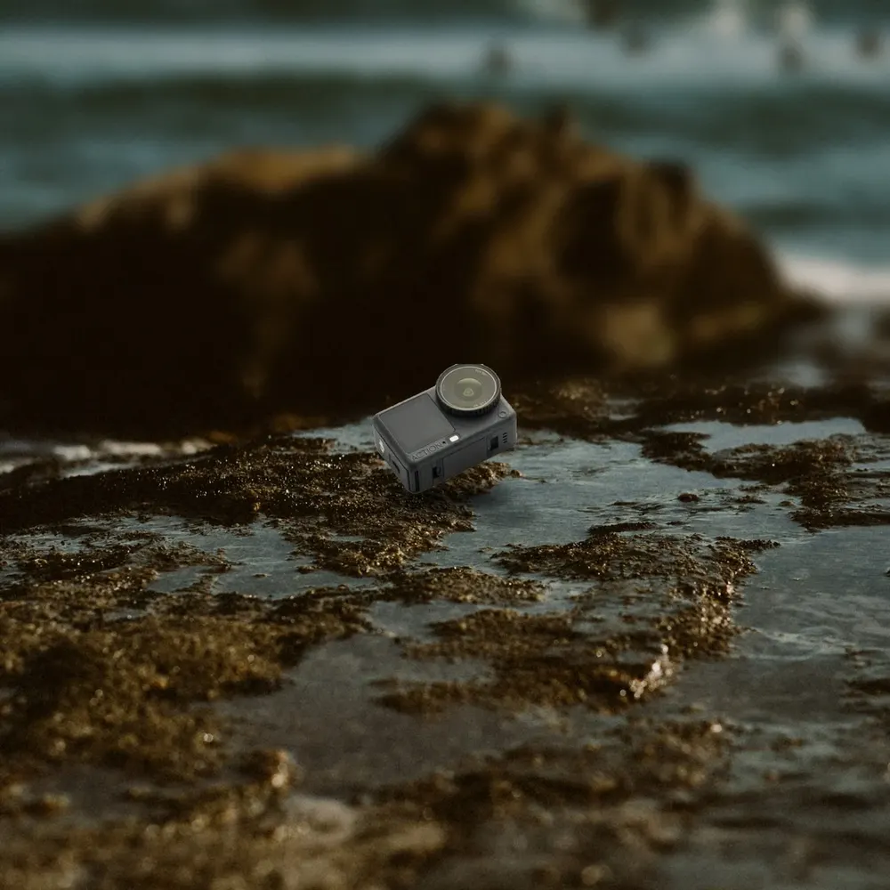 DJI Osmo Action 6 on a wet rock