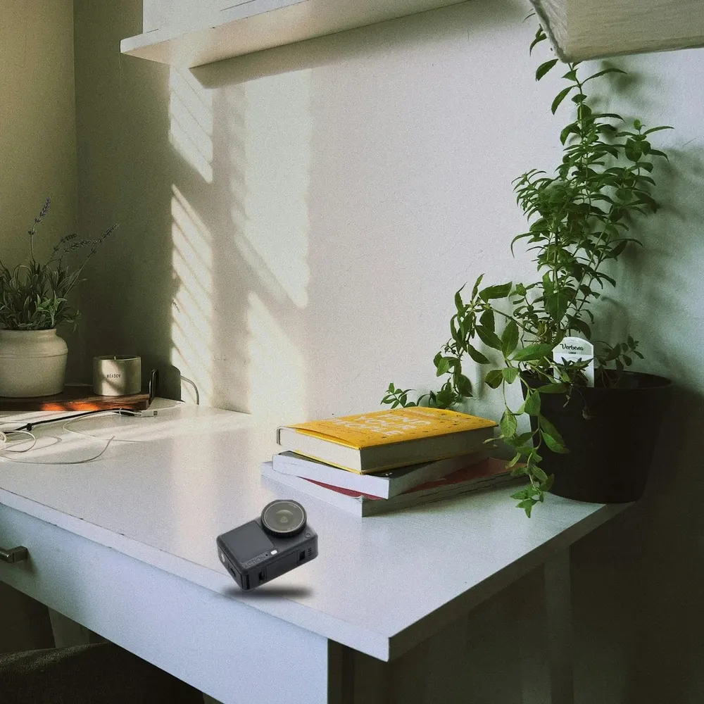 DJI Osmo Action 6 on a white desk