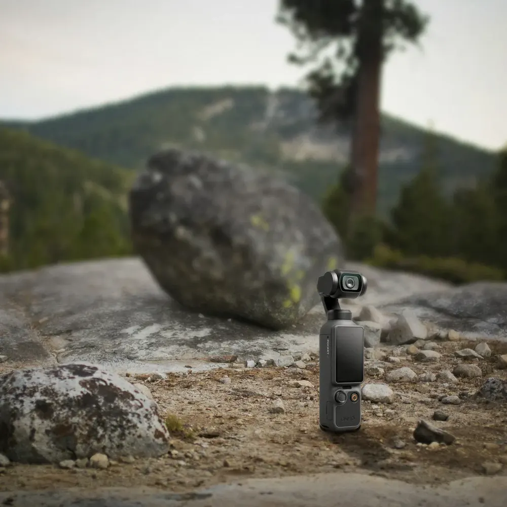DJI Osmo Pocket 4 on a boulder outdoors